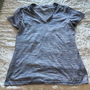 Blue and white weathered Reebok dry fit shirt